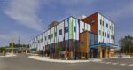 Grandview Kids – The Jerry Coughlan Building: The 4-story building features extensive glass curtain walls and a covered, accessible drop-off area.